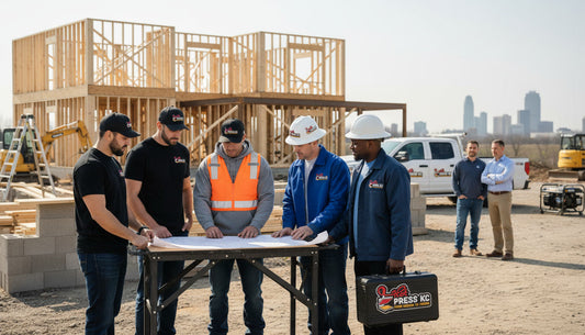 Kansas City contractor crew wearing custom branded DTF apparel from HotPressKC on a local job site